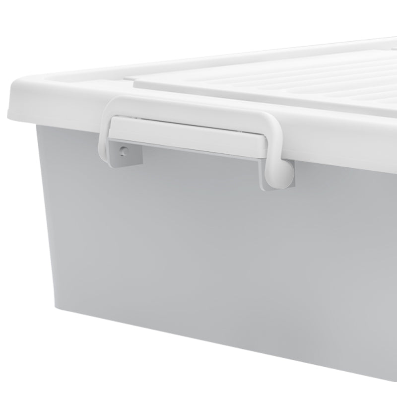 Close-up of a white Marcolo storage box with a latch.