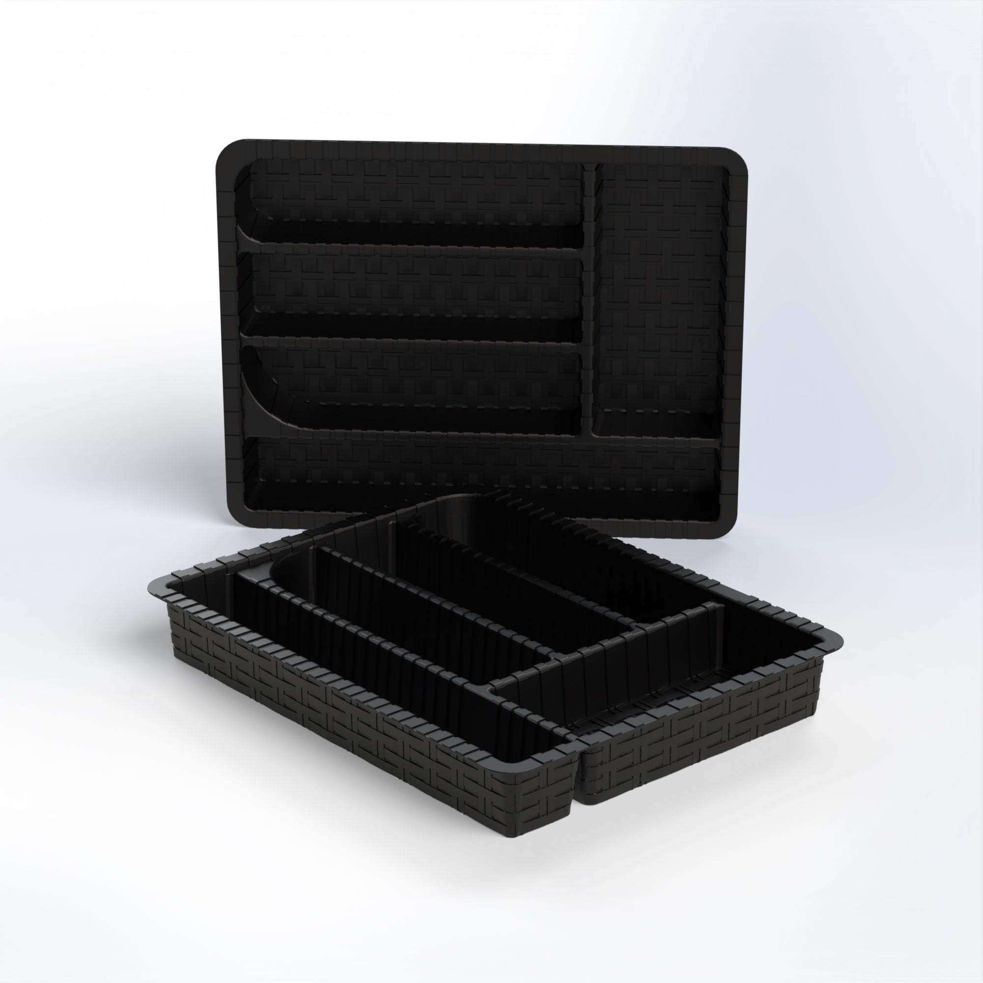 Two stacked black plastic Marcolo cutlery drawer organizers.
