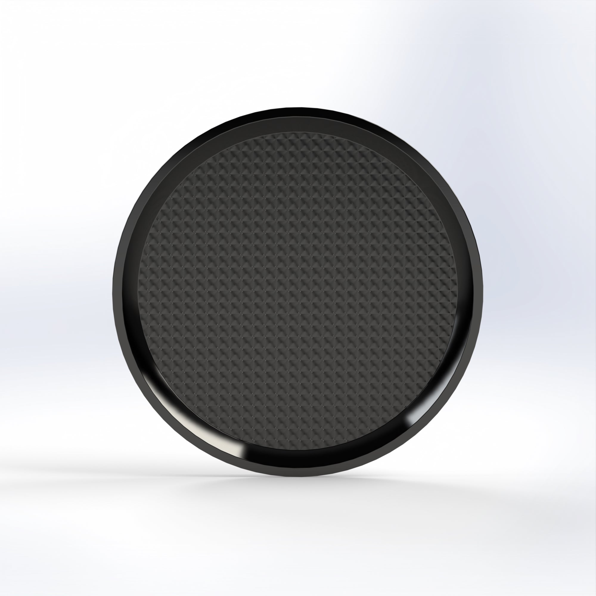 Marcolo round black non-slip serving tray with a textured surface.