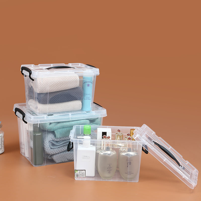 Marcolo clear plastic storage boxes with black handles.