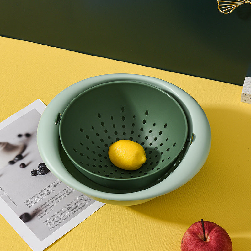Marcolo 2-in-1 bowl and colander set in sage and dark green.