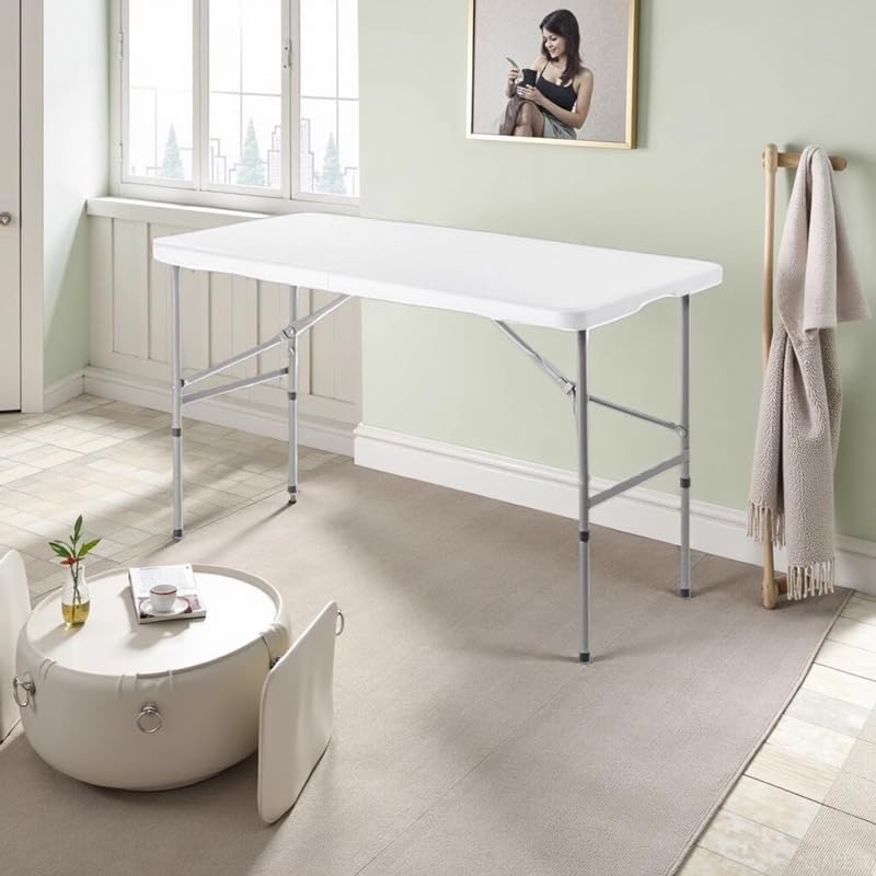 Marcolo white rectangular folding table in a bright room.