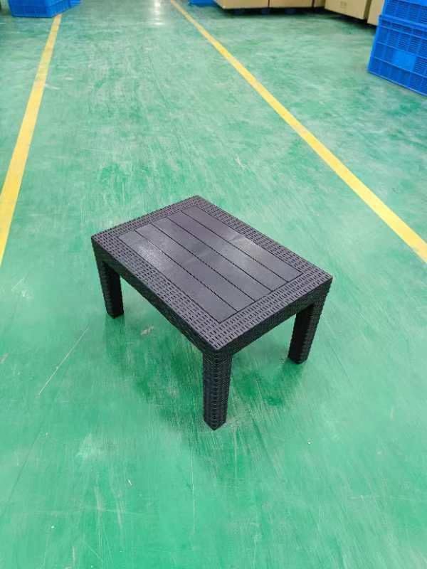 Marcolo black plastic rectangular outdoor coffee table.