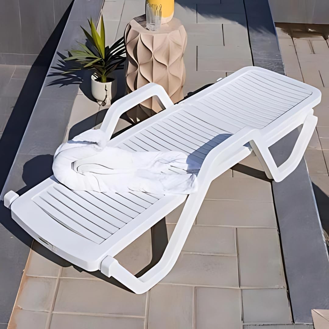 Marcolo white plastic adjustable sun lounger on a patio.