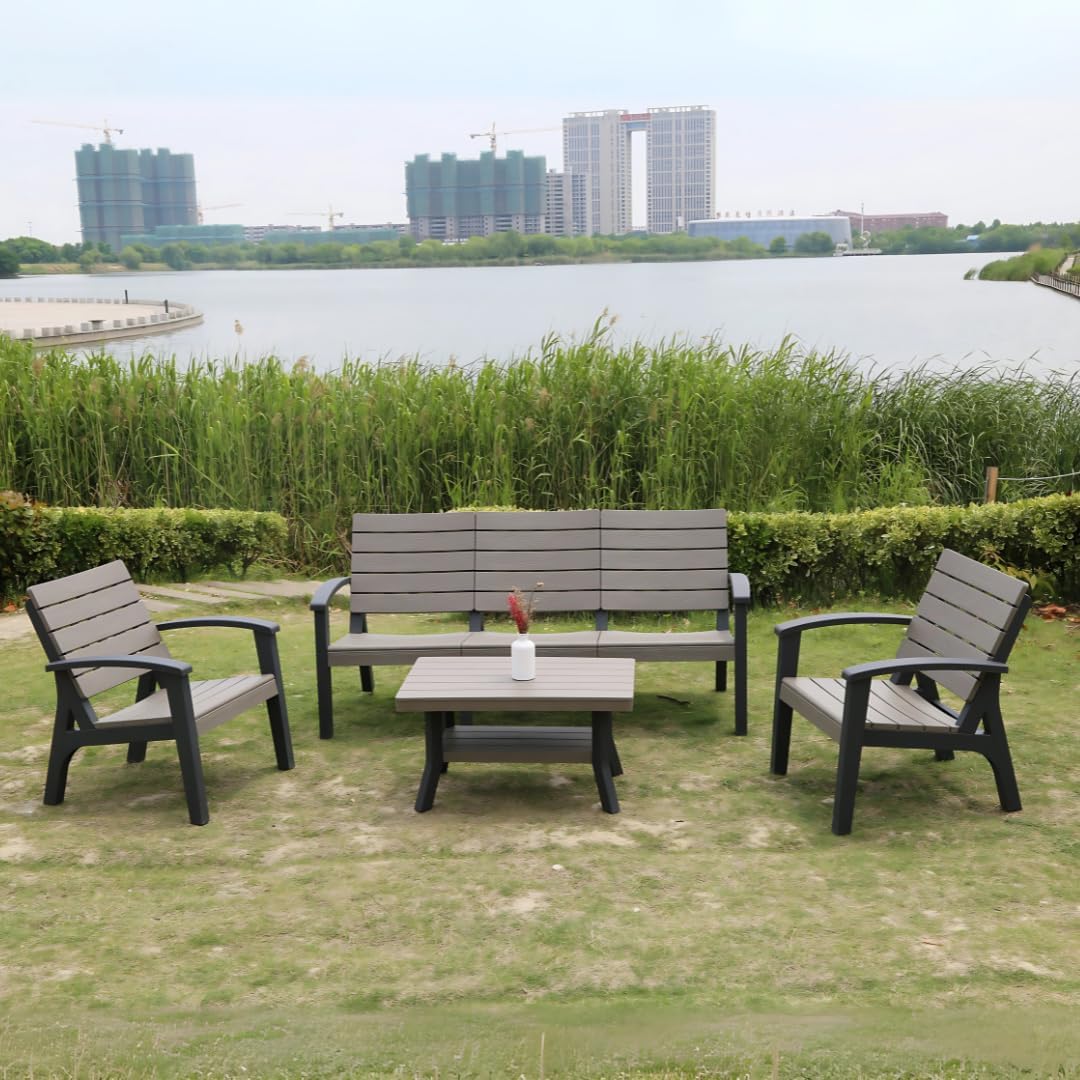 Marcolo 4-piece grey plastic outdoor furniture set on grass.