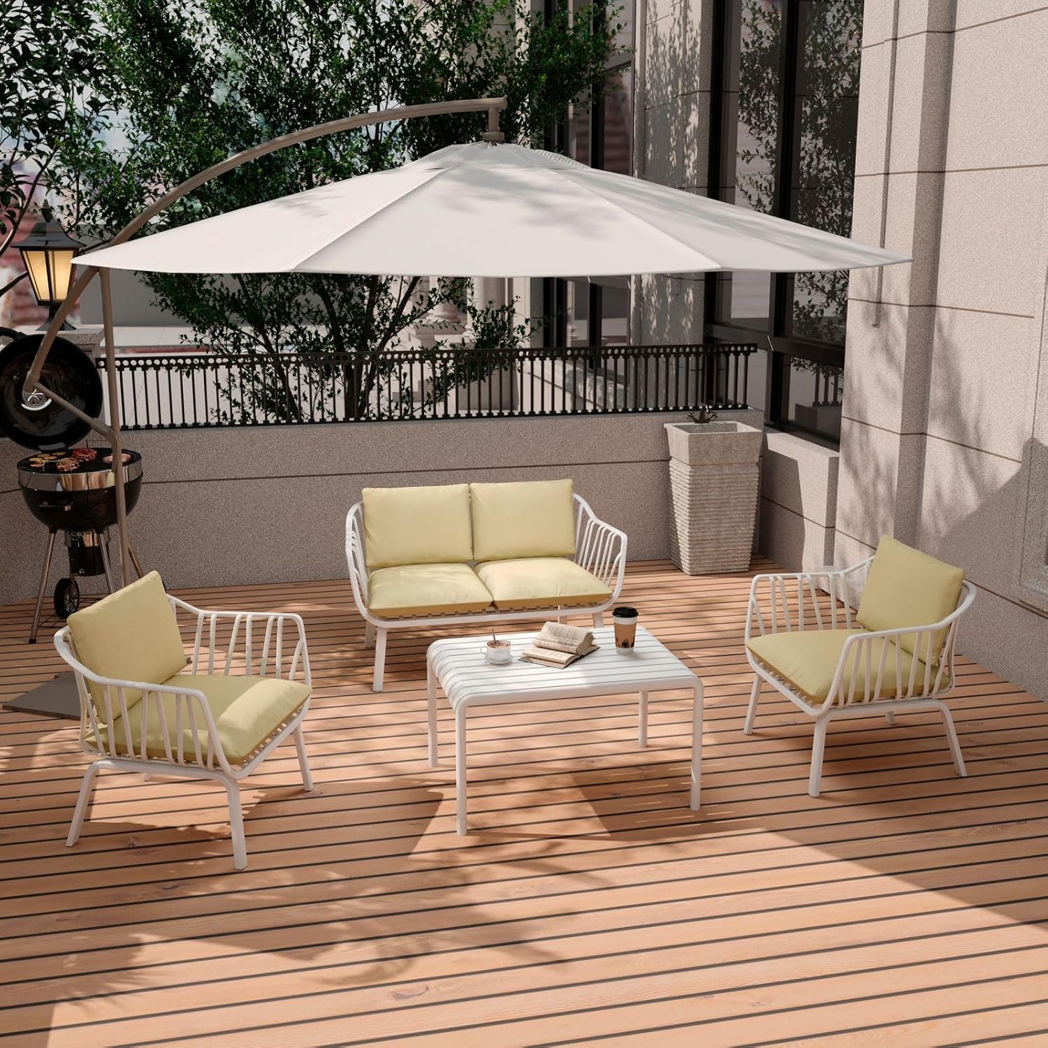 Marcolo white wire patio set with yellow cushions on a deck.