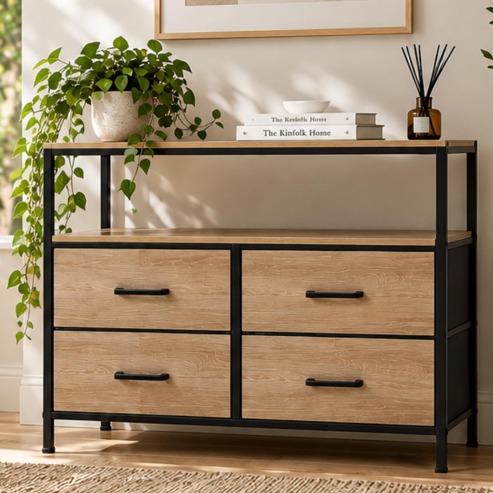Casa 4-drawer dresser with plant and books in a living room