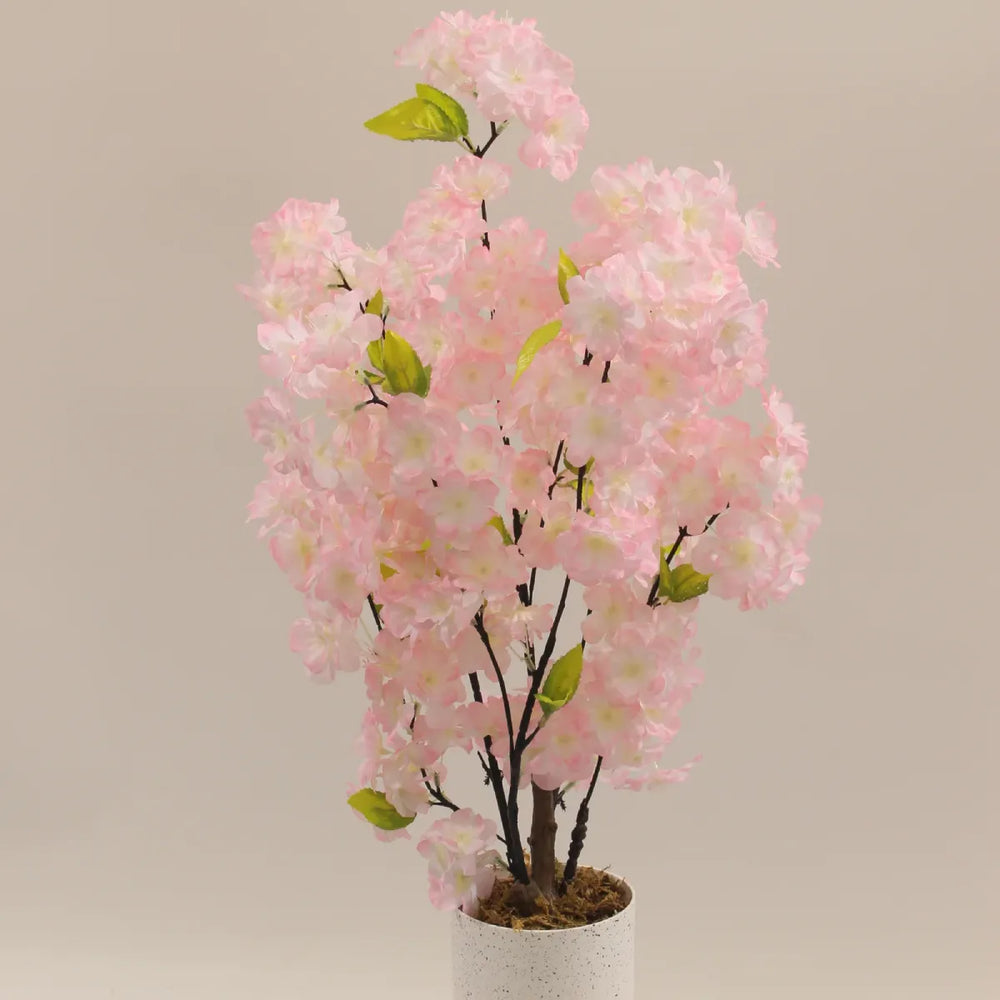 Close-up of the pink blossoms on the Marcolo 60 cm artificial cherry blossom bonsai