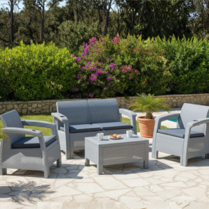Marcolo 4-Seater Silver Outdoor Sofa Set in a Lush Garden Setting