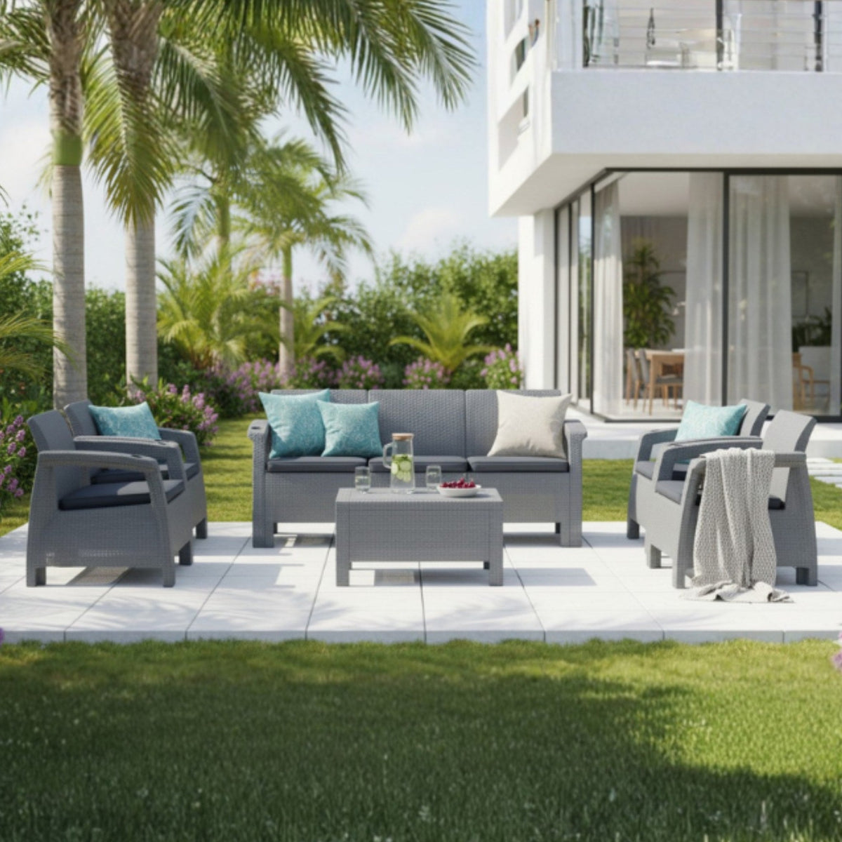 Marcolo Havana 7-seater rattan-style outdoor sofa set in dark brown in a garden setting