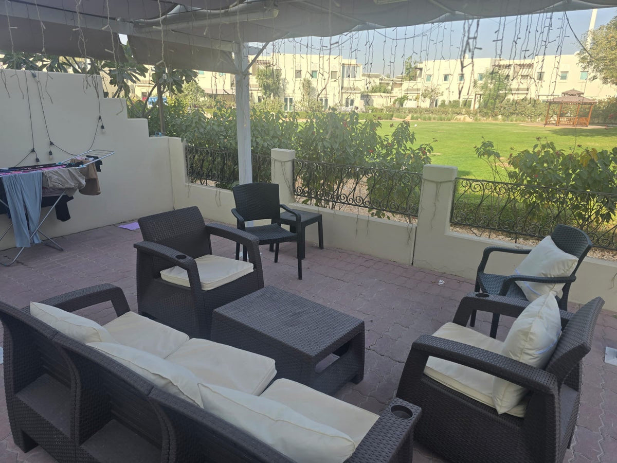 Customer photo: brown Havana 7-seater outdoor sofa set with back cushions on a UAE terrace