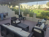 Customer photo: brown Havana 7-seater outdoor sofa set with back cushions on a UAE terrace