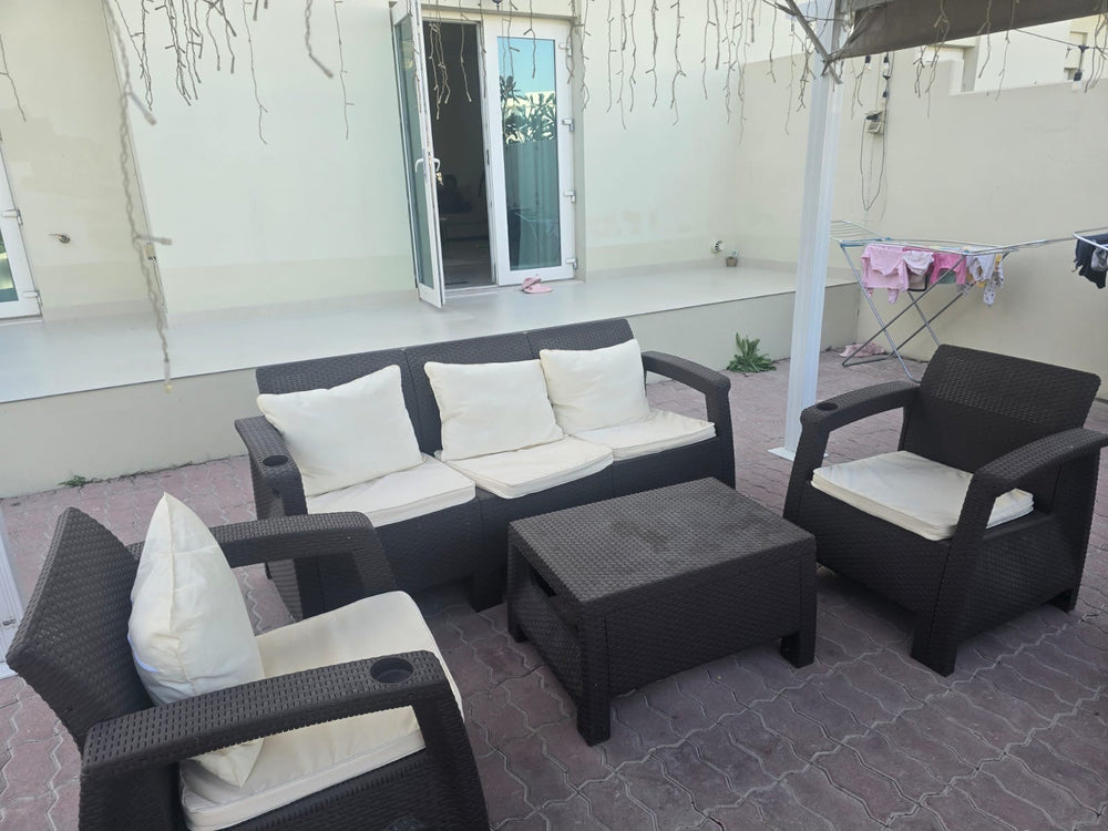 Customer photo: brown Havana 5-seater outdoor sofa set with back cushions on a UAE terrace