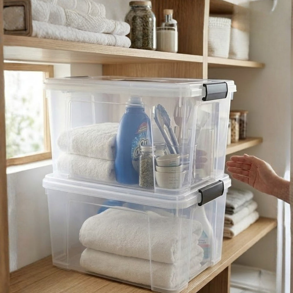 Two Marcolo 14L storage boxes stacked on a shelf with towels and toiletries