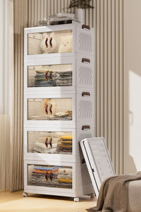 5-Layer Cabinet with Clear Doors & Wheels, 60×36×155 cm – in a living room