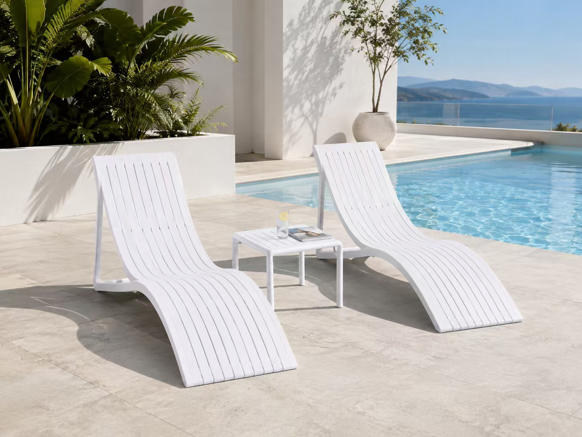 Marcolo Valencia sun lounger set, white, beside a pool