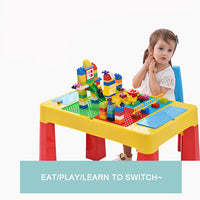 Girl building blocks on the yellow and brown kids activity table
