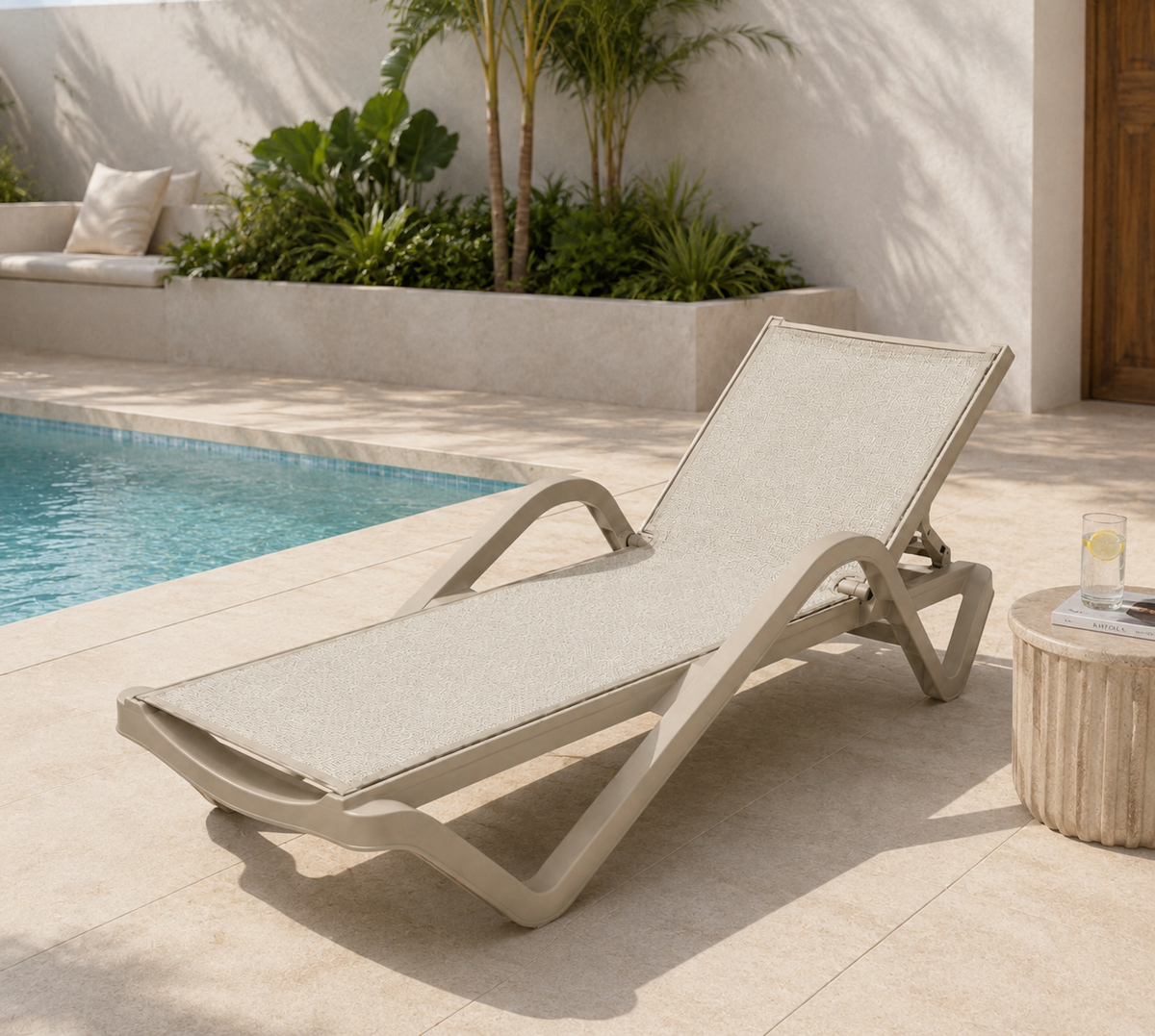 Java Textilene Sun Lounger – Beige, by the pool