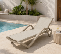 Java Textilene Sun Lounger – Beige, by the pool