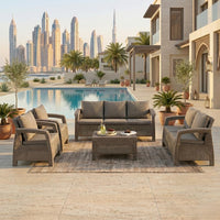 Grey Havana 7-seater sofa set with seat and back cushions by a pool with the Dubai skyline