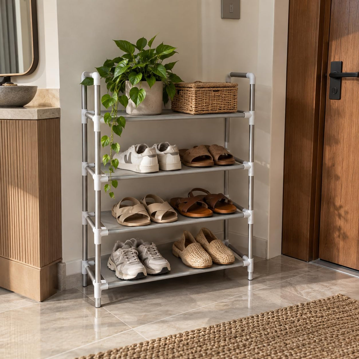 White and silver 4-tier shoe rack beside a front door
