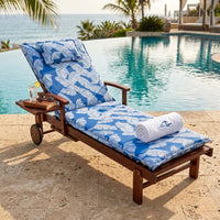 Phuket wooden sun lounger with blue leaf cushion by the pool