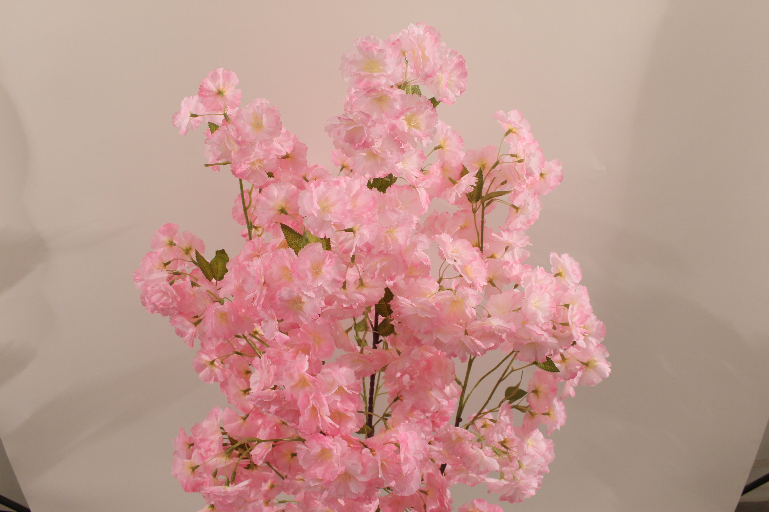 Pink artificial cherry blossom flowers by Marcolo.