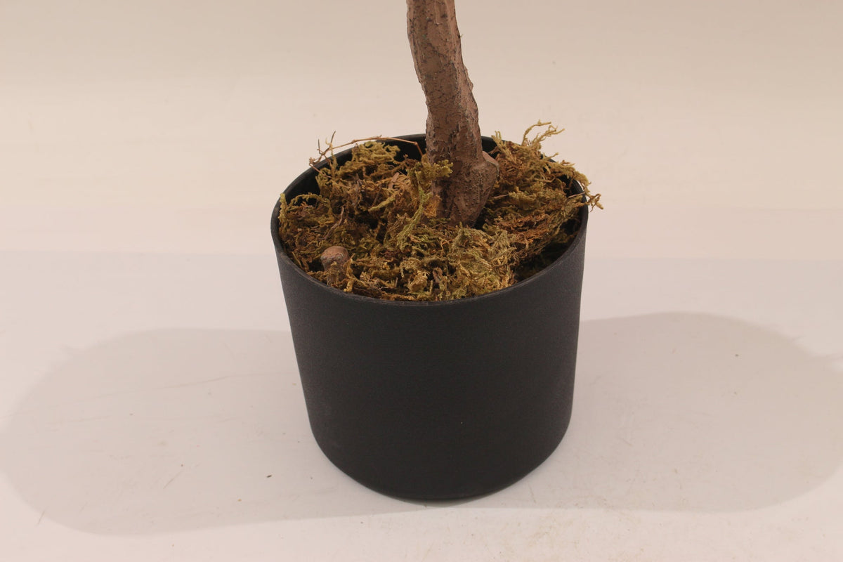 Base of the Marcolo artificial cherry blossom tree in a black pot