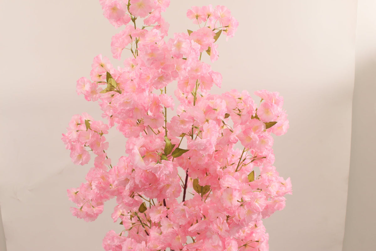 Close-up of the pink blossoms on the Marcolo 150 cm artificial cherry blossom tree