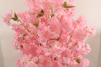 Pink artificial cherry blossom flowers by Marcolo.