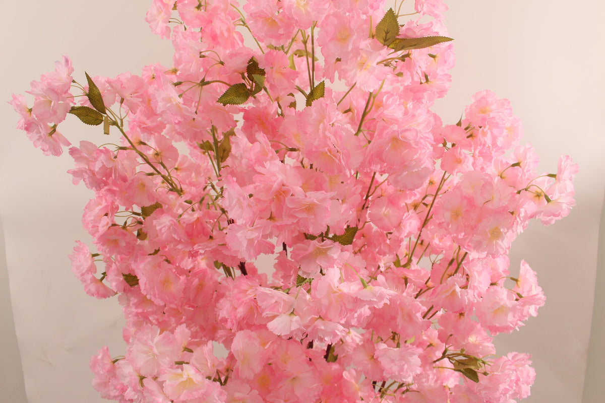 Pink artificial cherry blossom flowers by Marcolo.