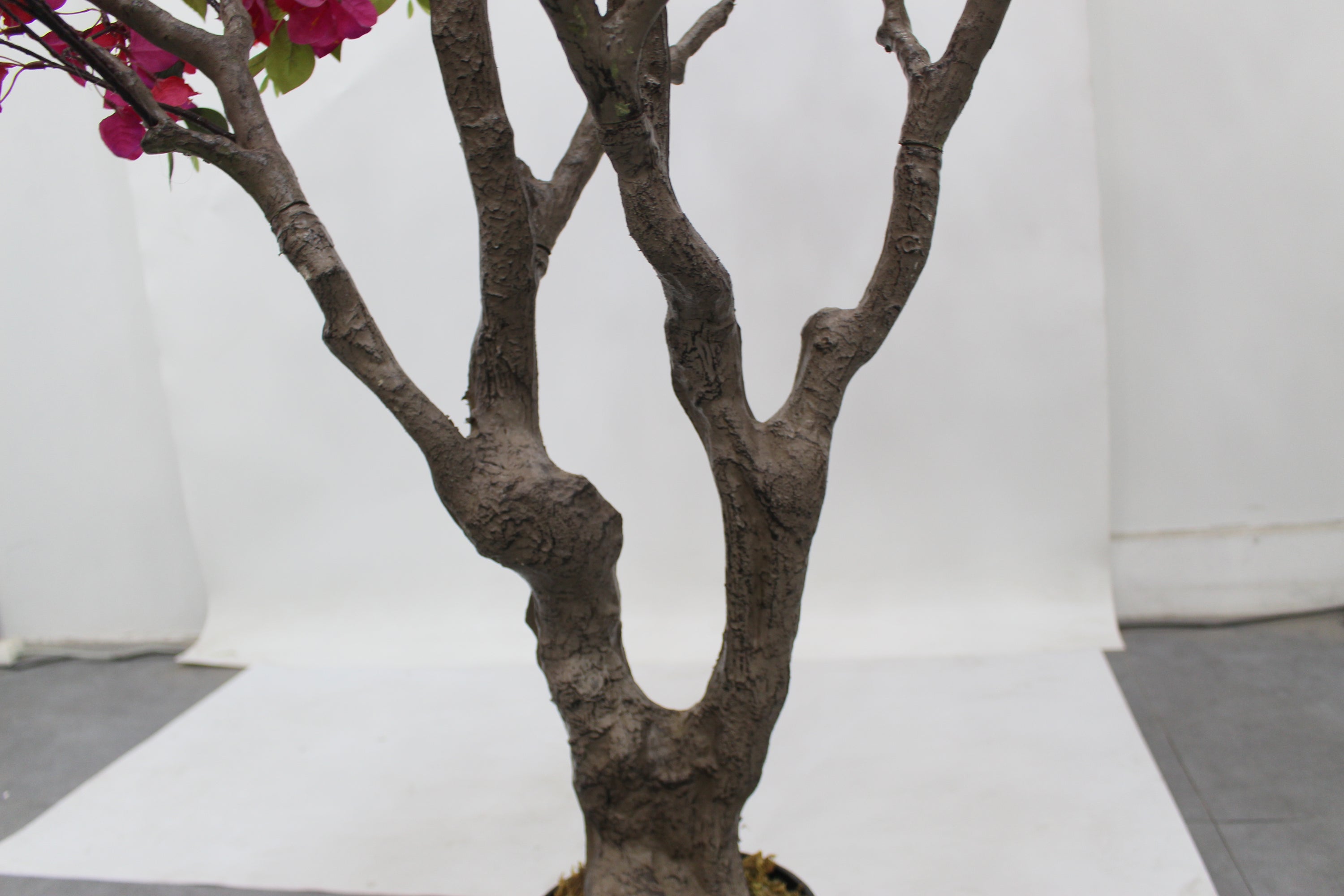 Marcolo 150cm artificial bougainvillea tree detail showing a realistic, thick textured trunk.