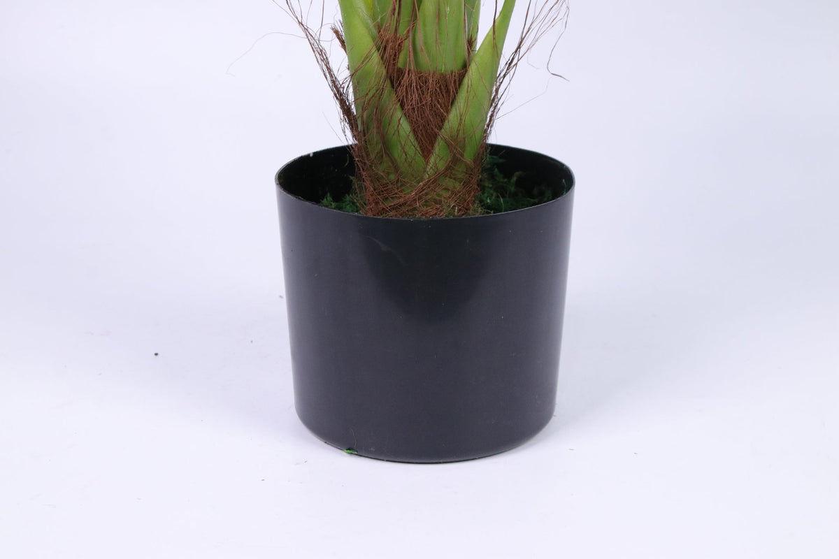 Marcolo artificial Persian palm tree base in a black pot.