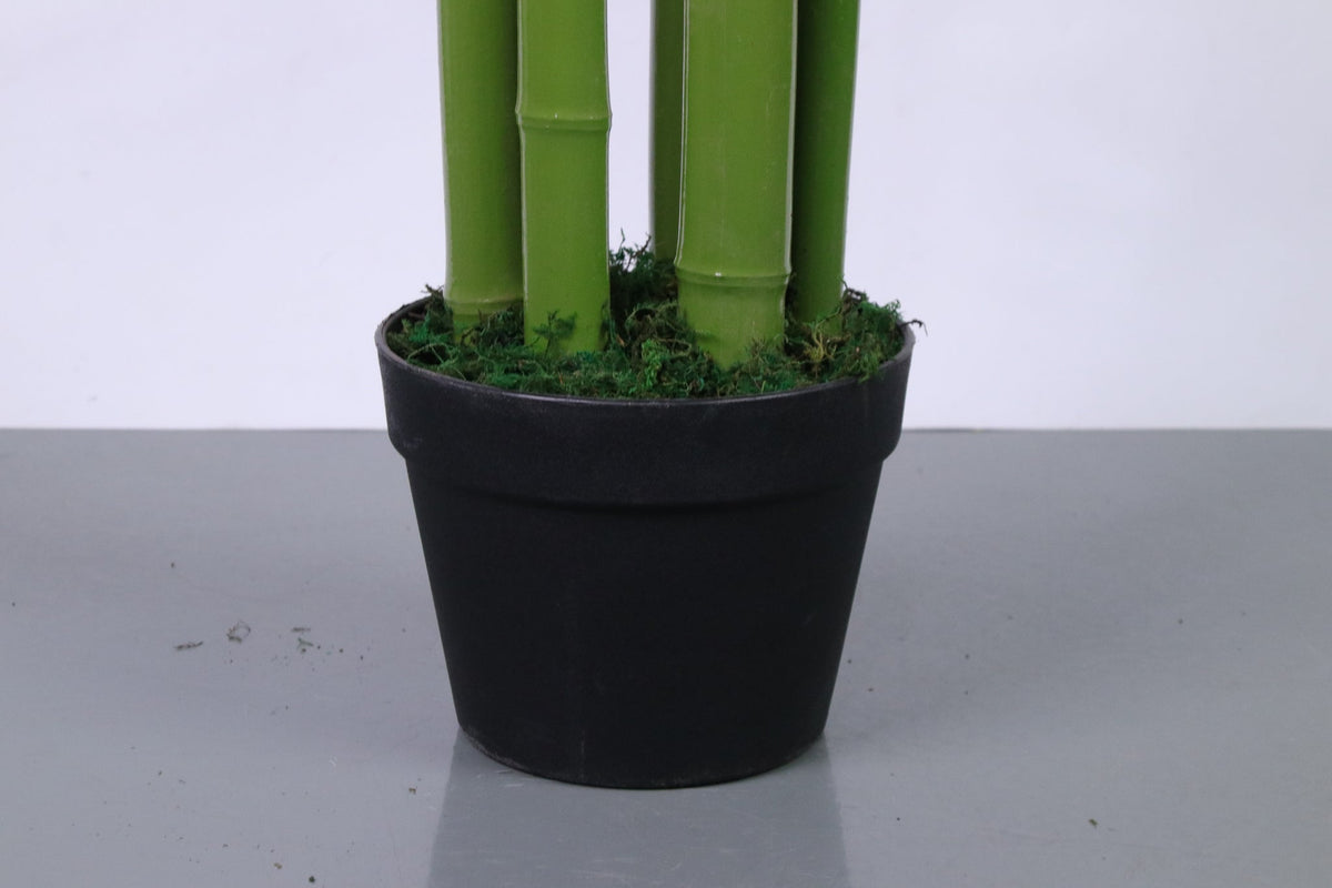 Base of the Marcolo 180 cm artificial bamboo plant in a black pot