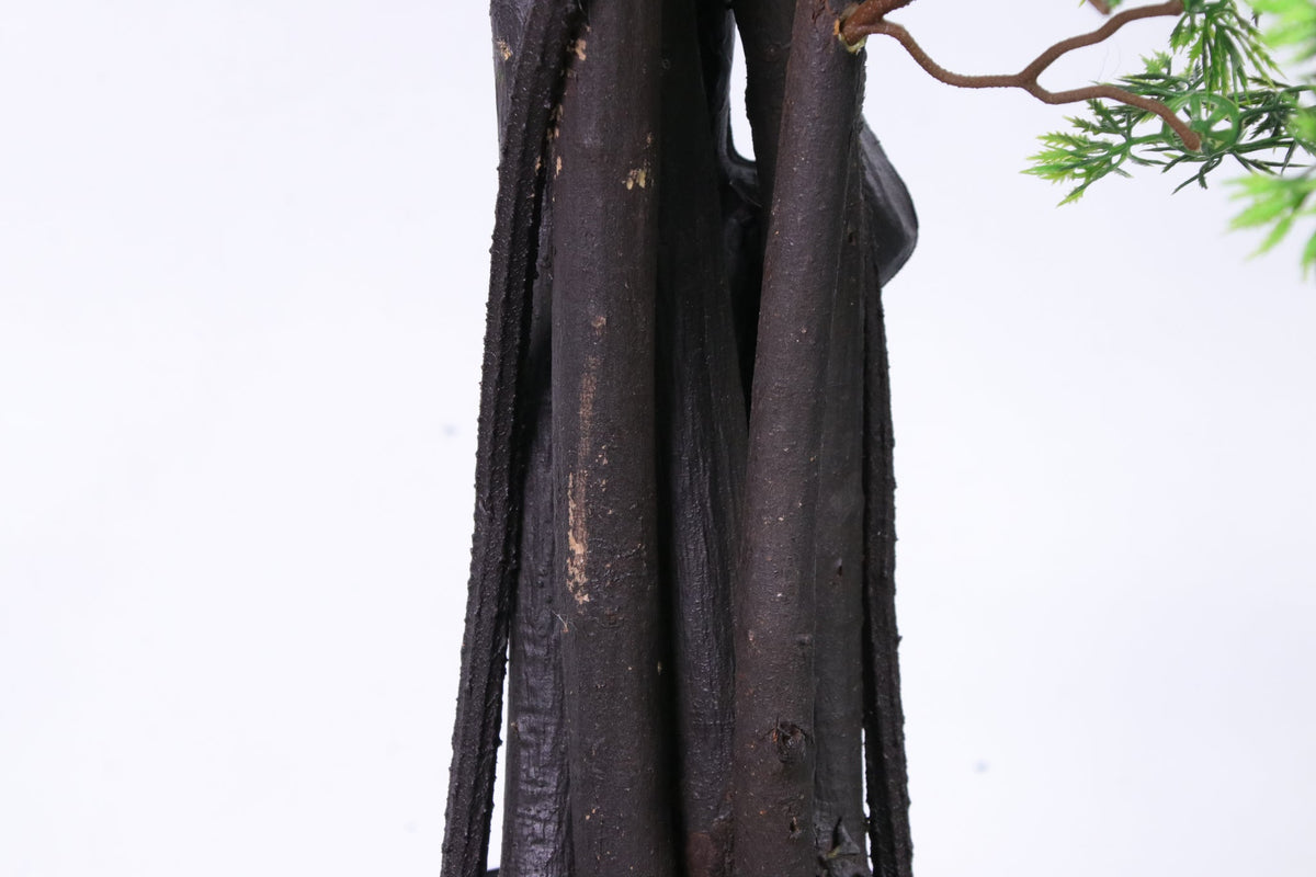 Marcolo artificial pine tree trunk close-up detail