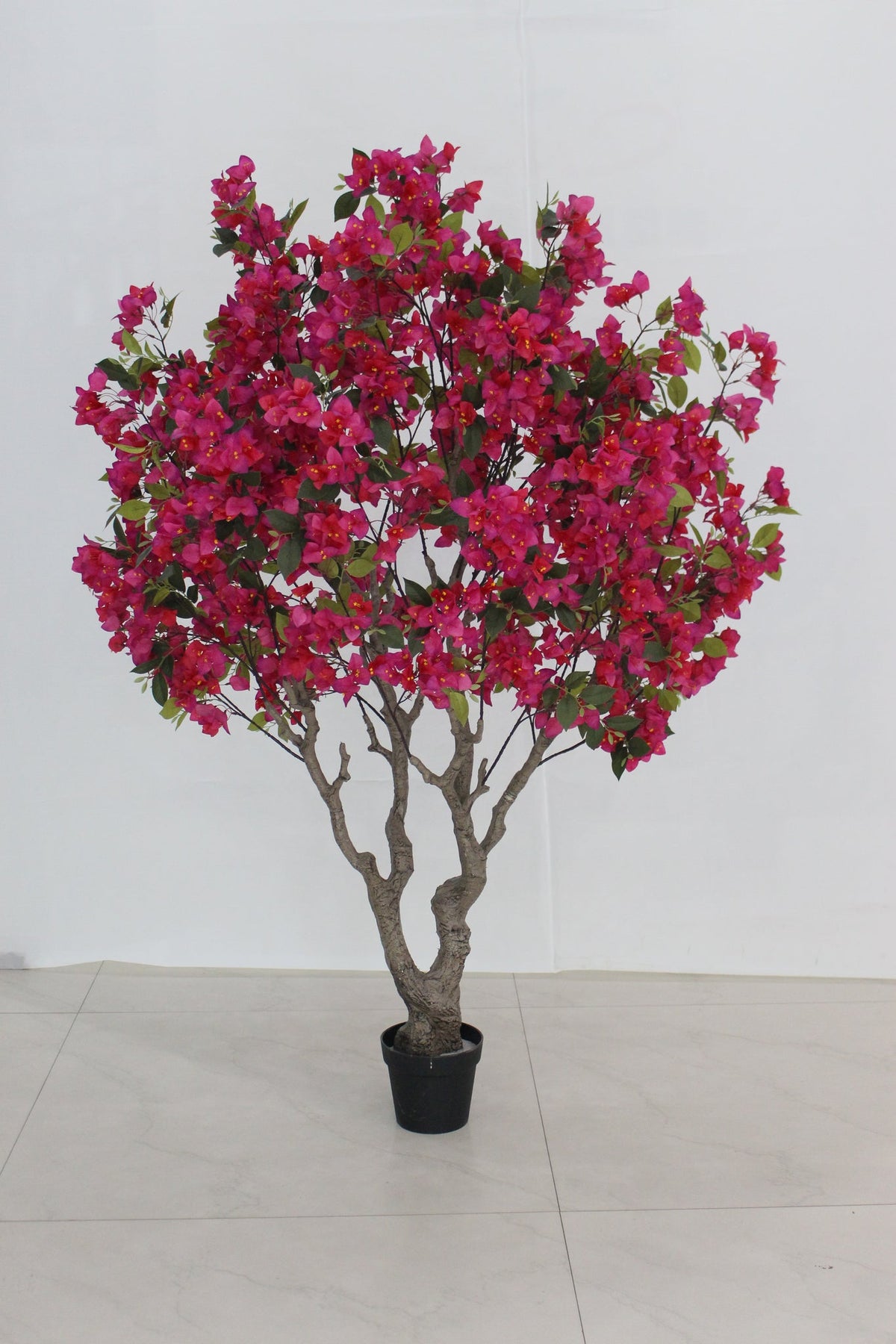 Marcolo 180cm artificial bougainvillea tree with lush magenta flowers and a natural-look trunk.