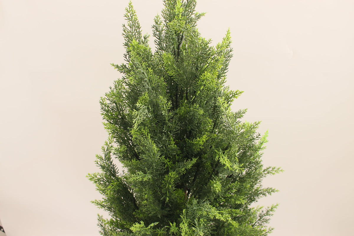 Close-up of the conical foliage on the Marcolo 120 cm artificial pine tree
