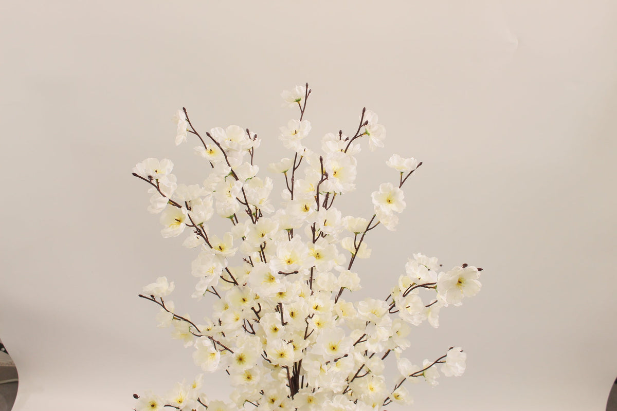 Close-up of the white blossoms on the Marcolo 95 cm artificial wintersweet plant
