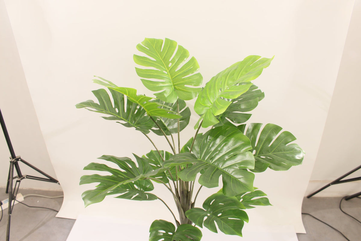 Close-up of the split leaves on the Marcolo 110 cm artificial monstera plant