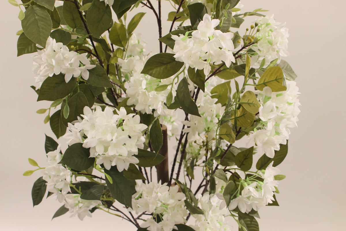 Close-up of the white flower clusters on the Marcolo 120 cm artificial lilac tree