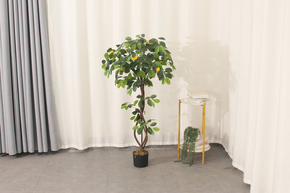 Artificial lemon tree, 120 cm, styled in a bright room corner