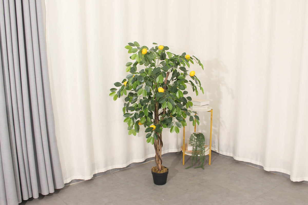 Marcolo 120 cm artificial lemon tree in a room beside a side table