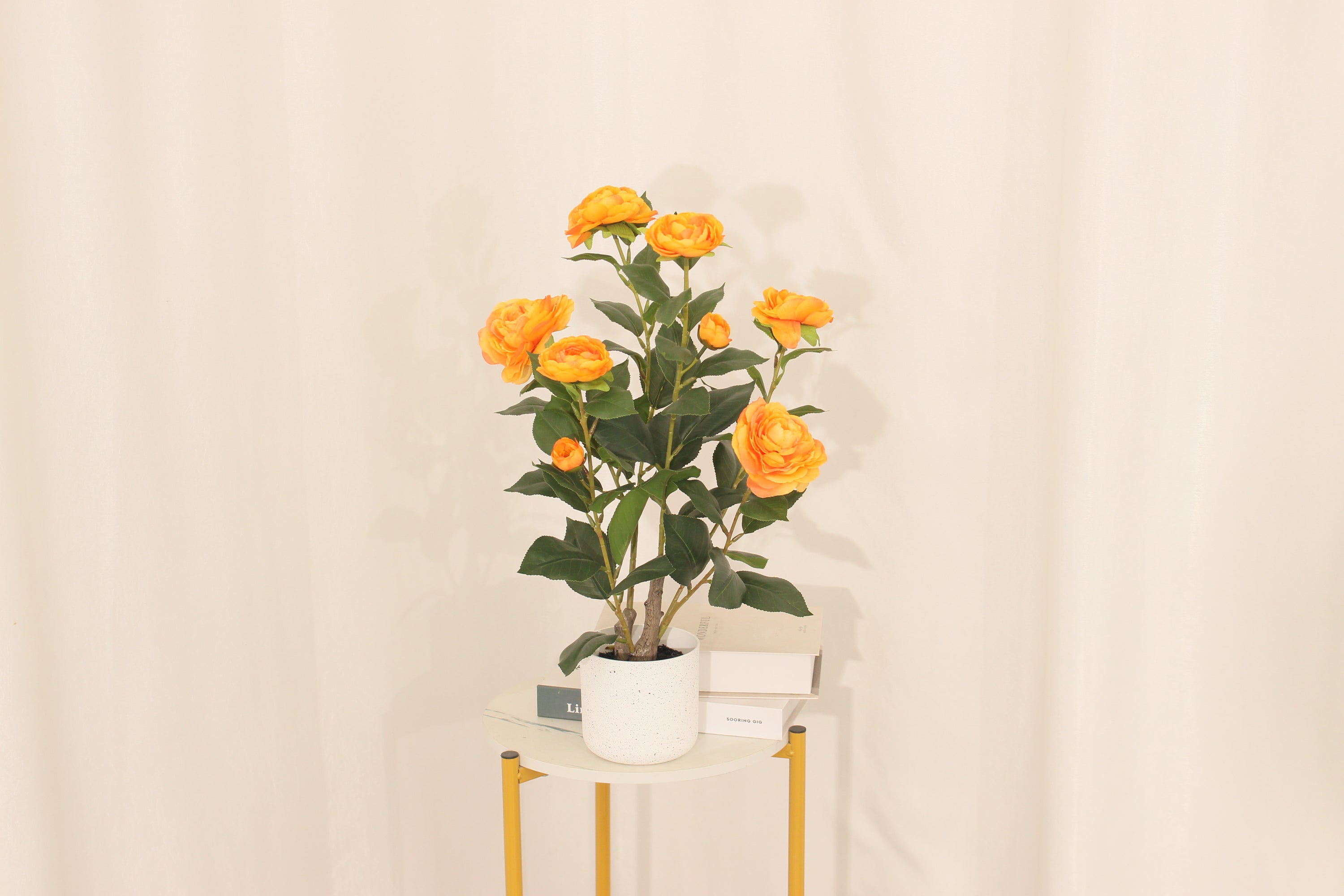 Artificial 50cm orange camellia in a white pot by Marcolo.