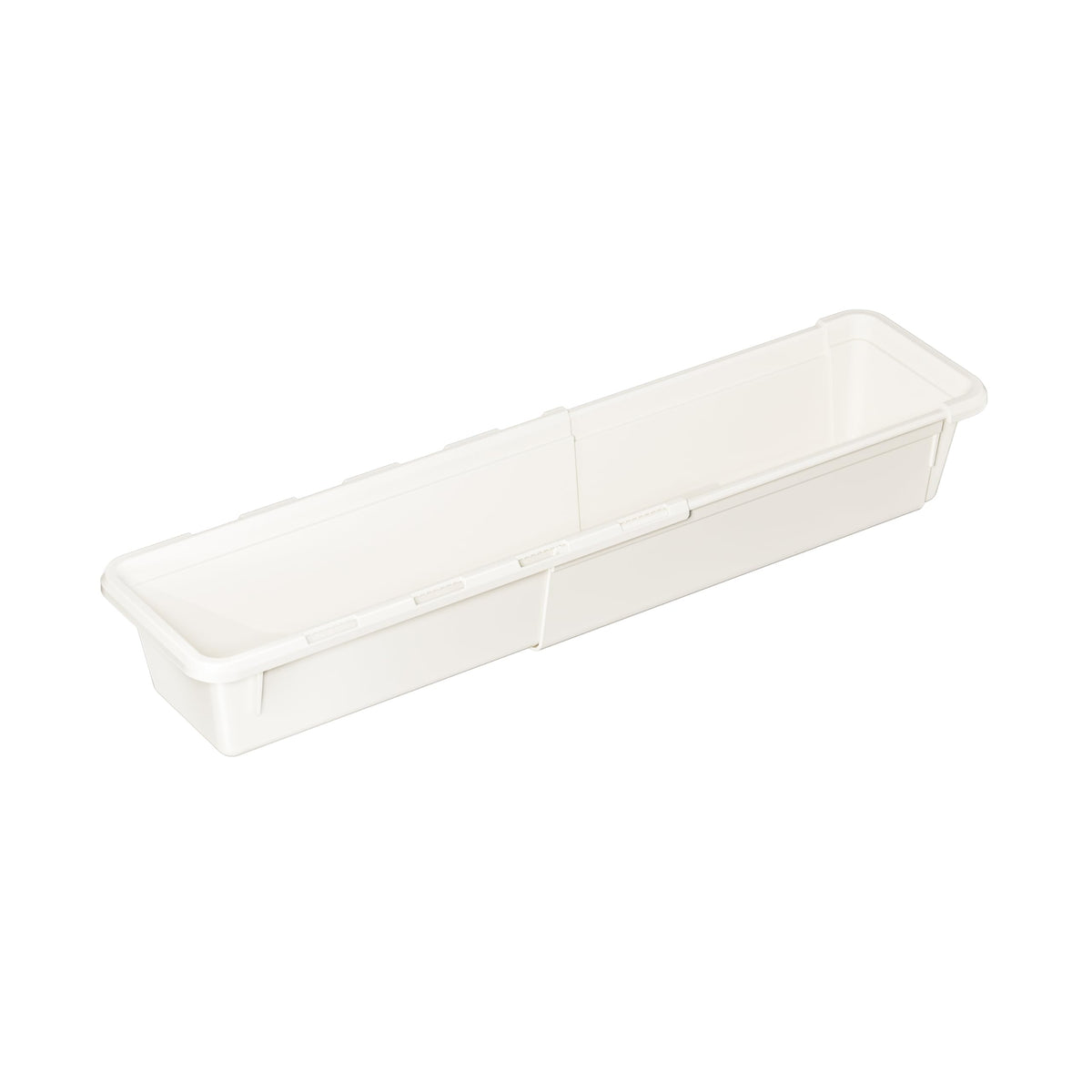A long, narrow, white, plastic drawer organizer tray.