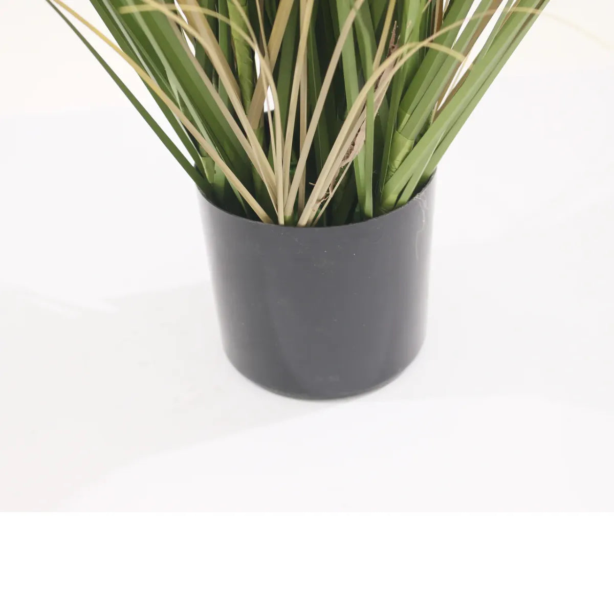 Marcolo 90cm artificial grass plant in a sleek black pot.