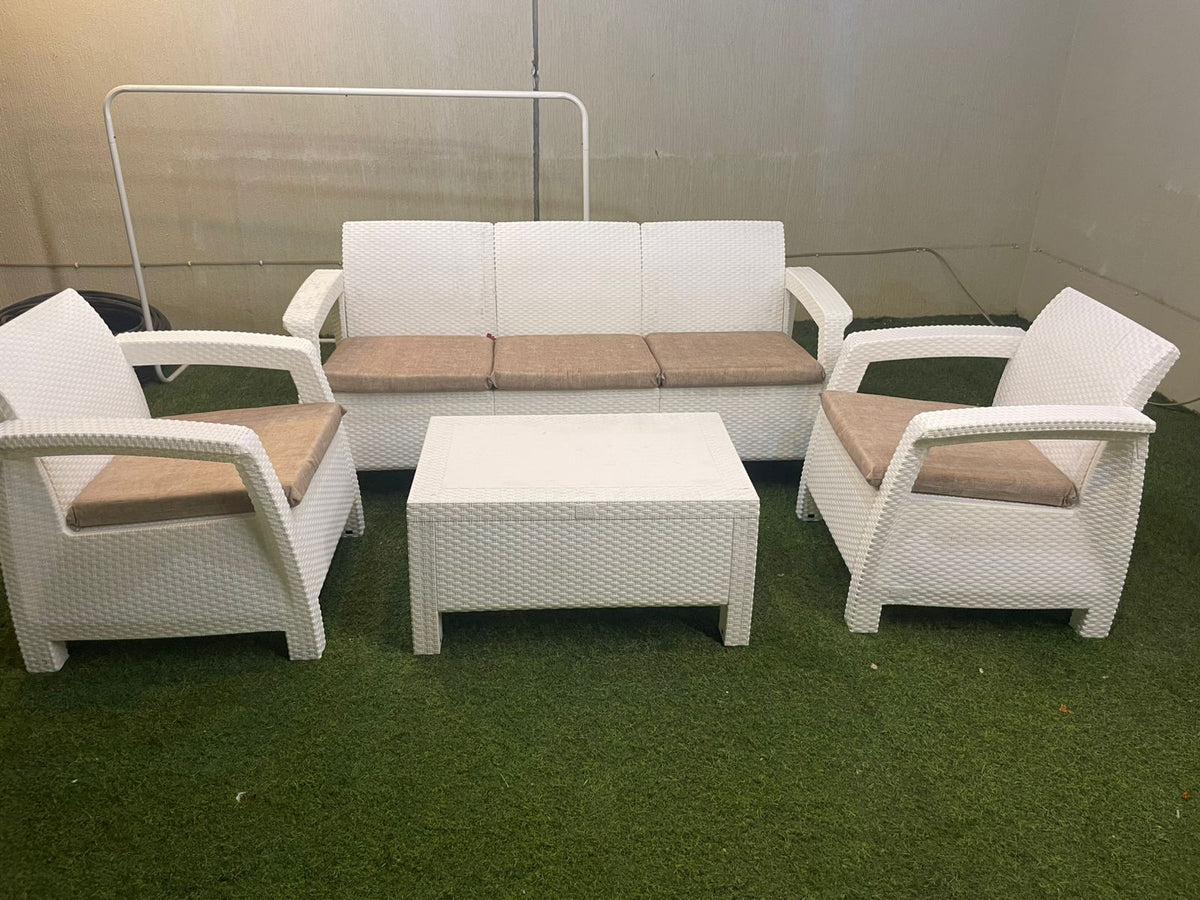Customer photo: white Havana outdoor sofa with armchairs and table on a UAE lawn