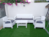 Customer photo: white Havana outdoor sofa with armchairs and table in a UAE garden