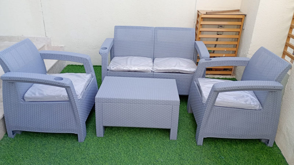 Customer's light grey Havana rattan-look 4-seater sofa set on an artificial grass balcony