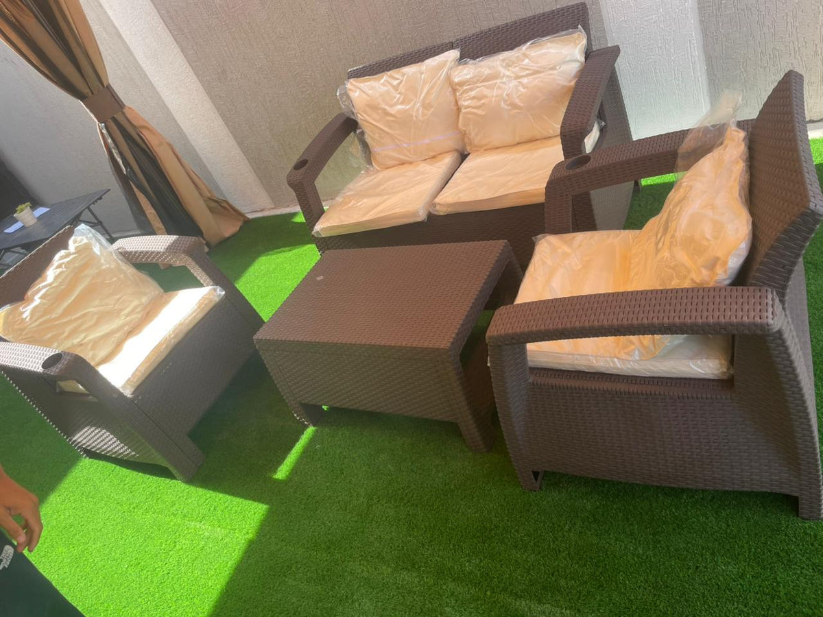 Customer photo: dark brown Havana 4-seater outdoor sofa set with back cushions on a UAE terrace