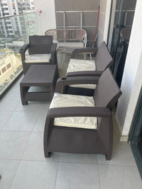 Customer photo: brown Havana armchairs and table on a UAE high-rise balcony